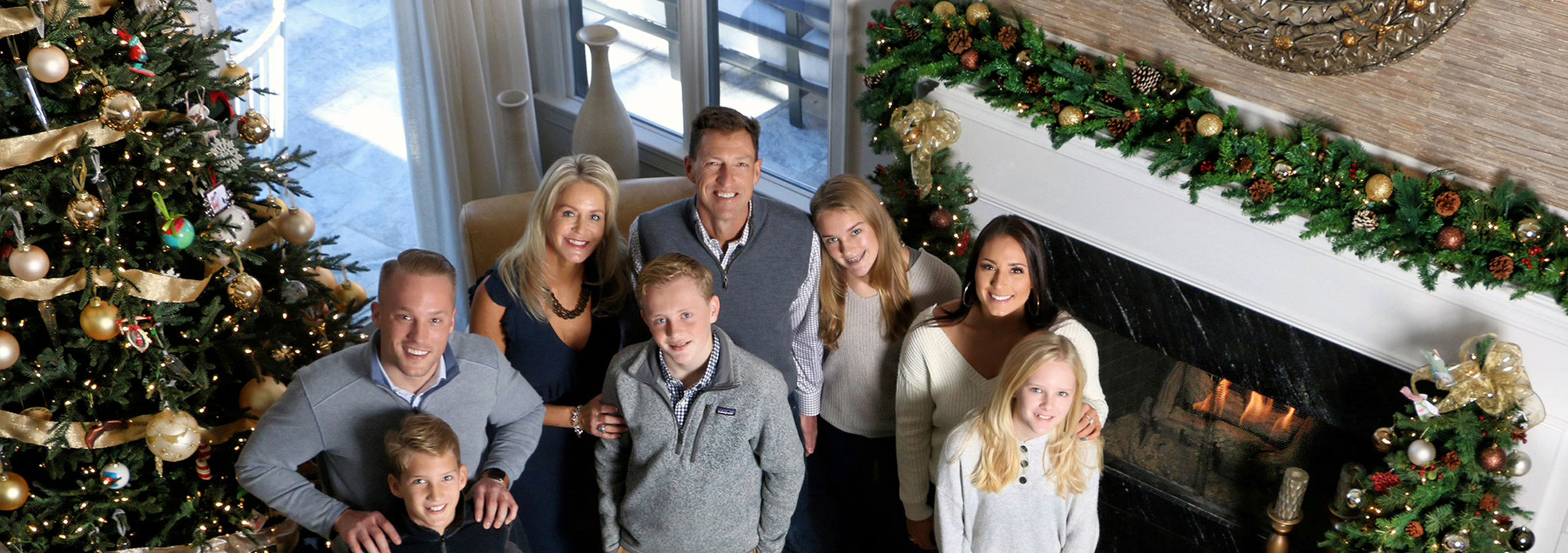 Deborah Young photo - family with Christmas tree and garland